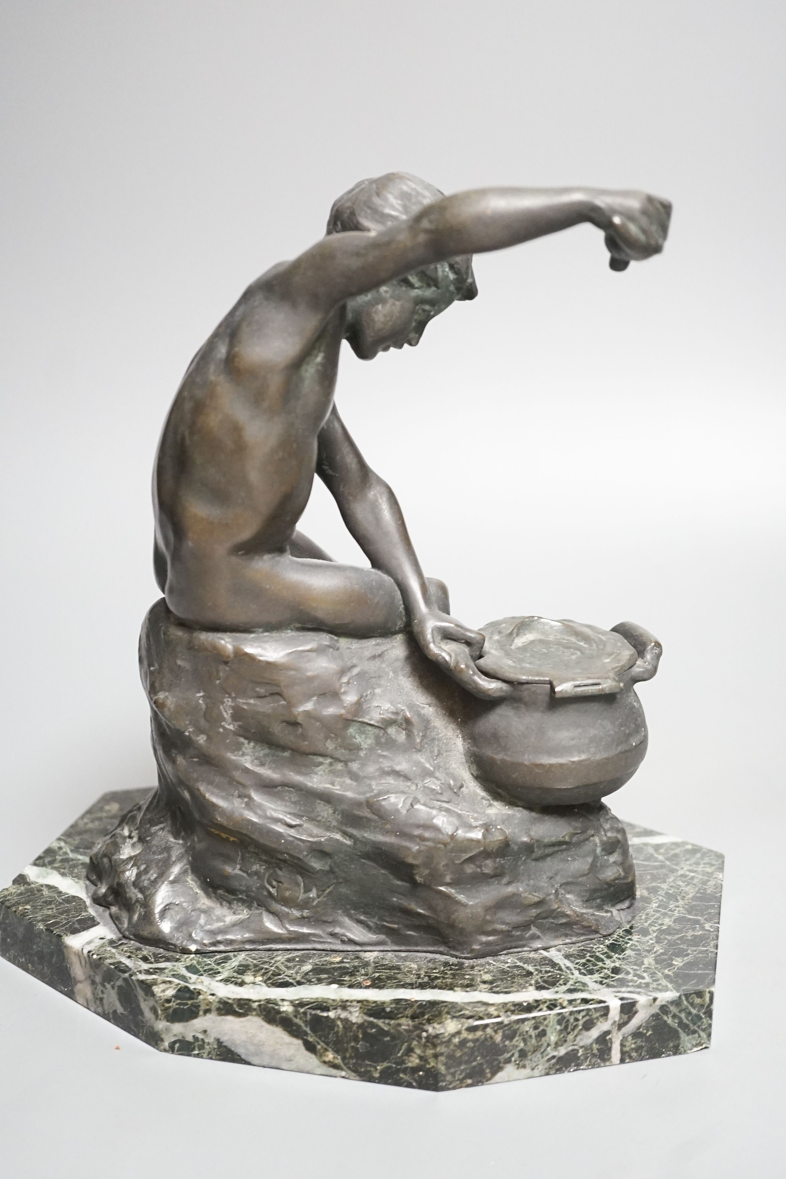 Lucy Gwendolen Williams (1870-1955). A bronze figure of a seated youth, green marble plinth, 24cm high